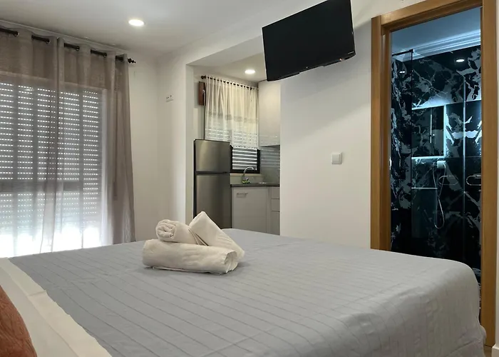 E Quartos Primorosa Апартаменты *